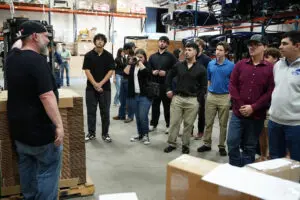 Attendees photographing Factory Five builds at Open House