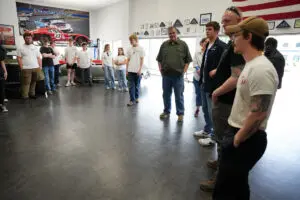 Factory Five staff discussing custom roadster builds