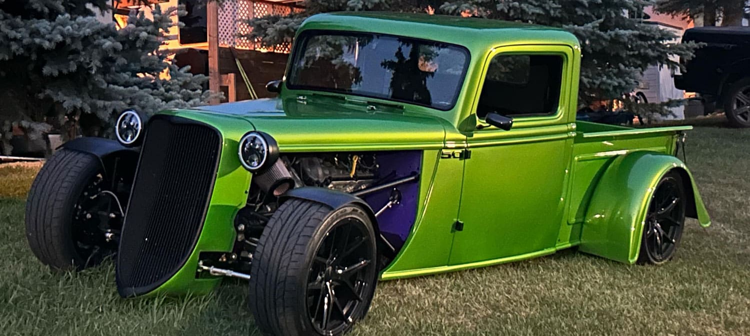 Green hot rod truck with flame paint
