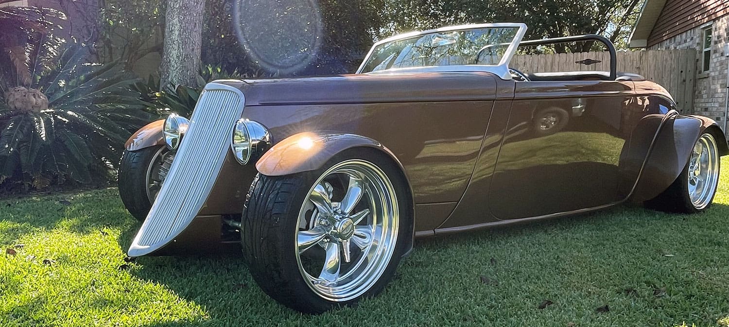 Brown hot rod front wheel closeup