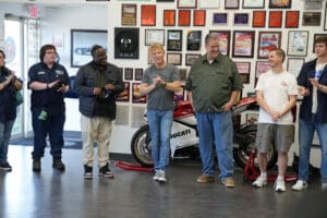 Vintage Factory Five race car display in showroom gallery