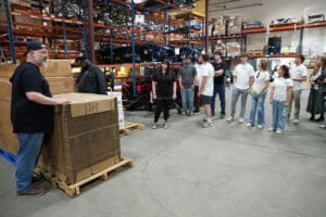 Factory Five Racing parts warehouse during facility tour