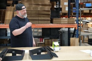 Factory Five specialist explaining the MK5 Roadster build process