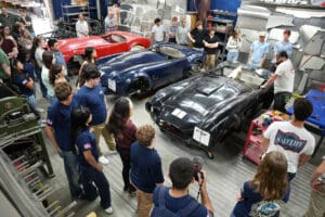 Classic Shelby Cobra roadster on display at Factory Five Racing showroom
